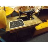 SINGER TREADLE SEWING MACHINE INSET IN WORK TABLE