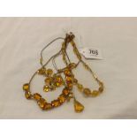 FOUR YELLOW VINTAGE NECKLACES