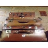 THREE BROWN VINTAGE SUITCASES