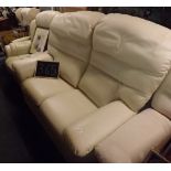 CREAM COLOURED LEATHERETTE TWO SEATER SETTEE