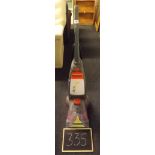 A VAX RAPID UPRIGHT CARPET CLEANER