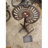 CAST IRON ADJUSTABLE BAR STOOL MADE FROM AN OLD TRACTOR SEAT ON FOUR FEET