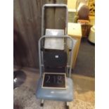 A BLUE STOOL WITH A METAL TWO TIER STEP LADDER & A METAL THREE TREAD STEP LADDER