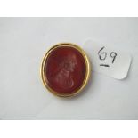 Hard stone oval intaglio set in gold