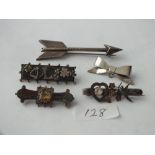 Five assorted silver brooches