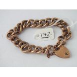 Curb link bracelet with heart padlock clasp in 9ct - 15.8gms