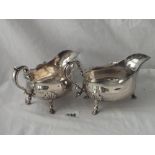 Good heavy pair of sauce boats on shell decorated cabriole legs and pad feet 7" long - London 1902 -