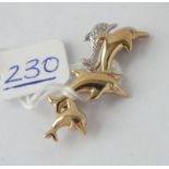 Gold & diamond dolphin brooch set in 9ct - 2.5gms