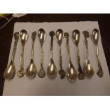 Group of 10 spoons with flower finials - 121gms