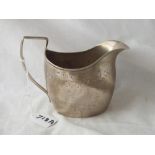 Georgian oval Irish cream jug engraved with a band of foilage - probably Dublin - 1825 by WD -