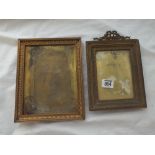 Two large brass picture frames