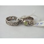 Two silver Celtic rings - one stone set - 7.6gms