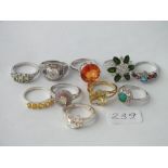 Ten silver stone set rings