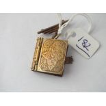 Antique book shaped multi section locket