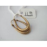 Pair of half hoop ribbed earrings set in gold - 1.1gms