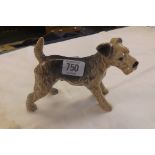 A DUTCHY POTTERY FIGURE OF AN AIRDALE TERRIER