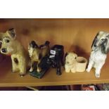 SHELF OF ANIMAL ORNAMENTS