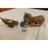 2 VINTAGE SCHUCO TIN PLATE TOYS OF A CAT & A PEAKING BIRD