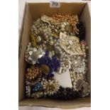 LARGE BOX OF COSTUME BROOCHES