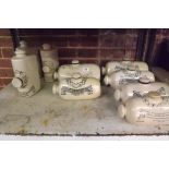 SHELF OF 9 DOULTONS IMPROVED FOOT STONE WARMERS BY THE LAMBETH POTTERY LONDON