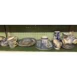 SHELF OF BLUE & WHITE PLATES, CUPS, SAUCERS ETC