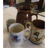 A BROWN JUG, A TWO HANDLED MUG WITH COCKEREL, A LORNA DOON CENTENARY MUG & 1 OTHER