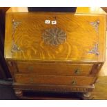 1930's CARVED OAK BUREAU WITH TWO DRAWERS, BRASS DROP HANDLES (2 EXTRA HANDLES IN DRAWER)