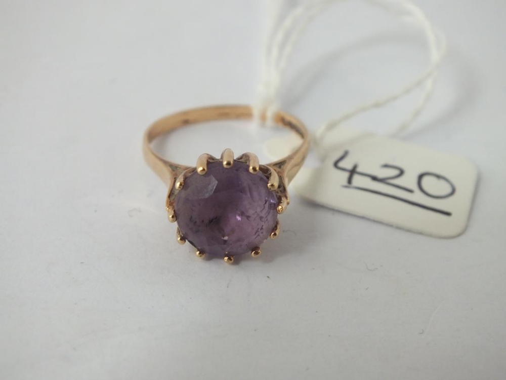 A circular purple stone dress ring set 9ct - size N - 3gms - Image 2 of 2