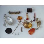 A bag of assorted costume jewellery incl. pendants etc.