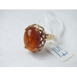 A large 9ct fancy amber ring - size R - 4.2gms