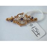 A amethyst & pearl ornate bar brooch in 9ct - 1.6gms