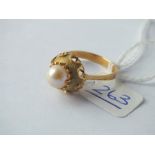 A pearl solitaire ring set in gold - size Q - 3.9gms