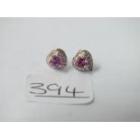 A pair of heart shaped pink stone & diamond earrings set in 9ct white gold