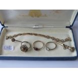 A box of assorted odd jewellery - rings, stick pins etc