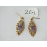 A pair of 9ct oval amethyst drop earrings - 2.5gms