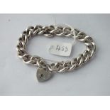A heavy curb link silver braclet - 54gms