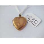 A heart shaped back & front locket in 9ct