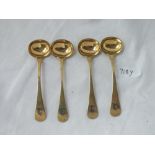 Set of four French silver gilt salt spoons with crests