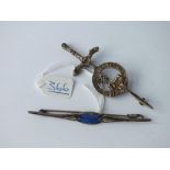 A silver enamel brooch & military sword brooch