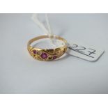 A ruby & diamond 5 stone ring in 18ct gold(1 stone missing) - size Q - 2.2gms