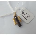 A small gold '13' charm