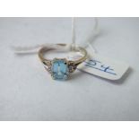 A blue gem & diamond ring in 14ct gold - size N - 2.4gms