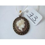 A Victorian gold mounted cameo pendant - 2.5gms
