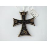 An inlaid tortoiseshell cross pendant