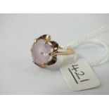 An oval purple stone dress ring set in 9ct - size M - 3gms