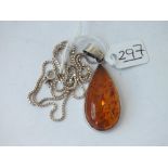 An amber & silver pendant necklace