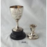 A trophy cup on wood plinth & a beaded edge candle stick - 46gms weighable