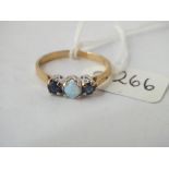 A sapphire & opal 3 stone ring in 9ct - size Q - 2.1gms