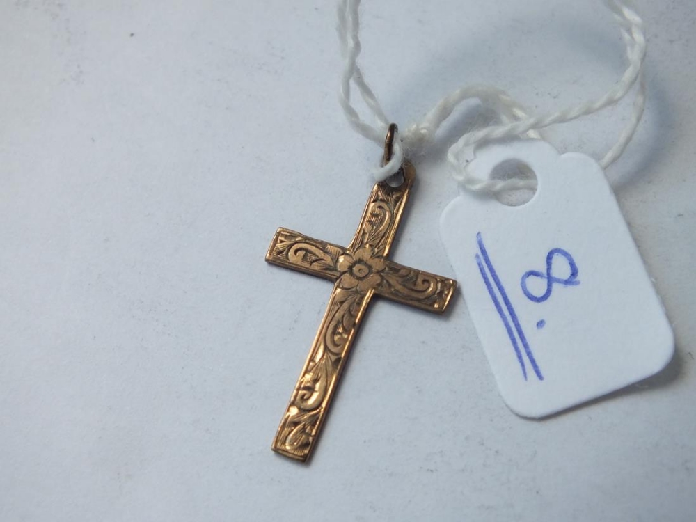 An engraved cross in 9ct