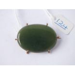 A jade oval pendant brooch